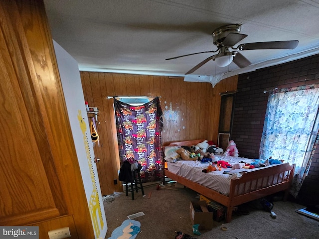14248 Cunningham Dr SW, Cumberland, MD 21502 - carpeted bedroom featuring wooden walls and a ceiling fan