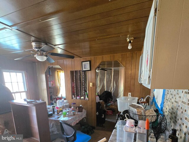 14248 Cunningham Dr SW, Cumberland, MD 21502 - dining room featuring wood ceiling, wood walls, and ceiling fan