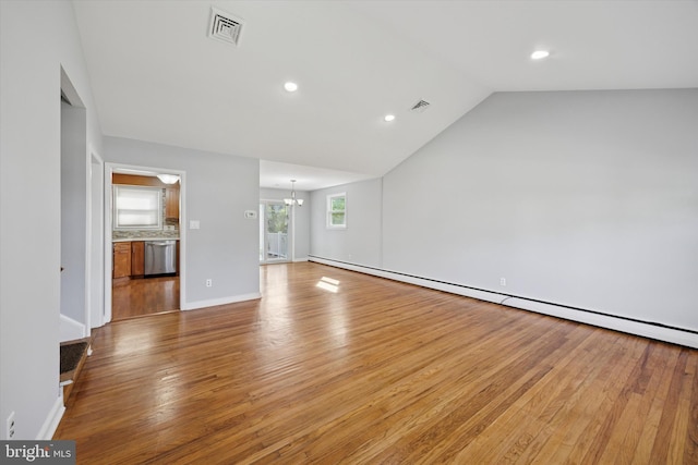 unfurnished living room with a notable chandelier, recessed lighting, wood finished floors, vaulted ceiling, and visible vents