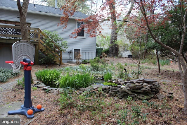 view of yard featuring stairs