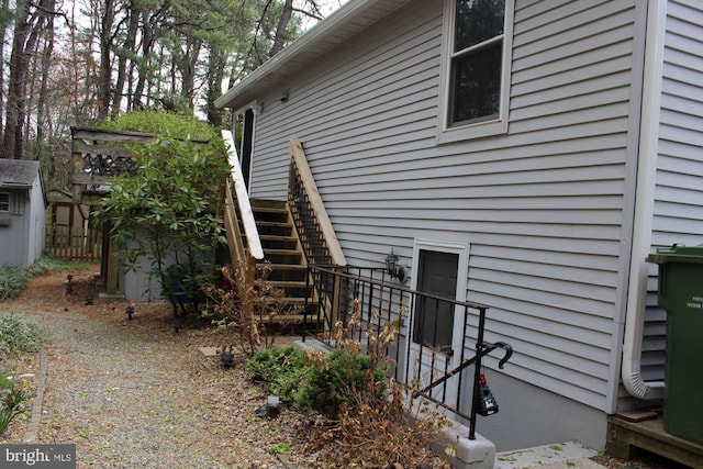 view of home's exterior featuring stairway