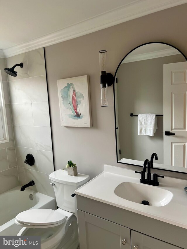 bathroom with shower / washtub combination, crown molding, toilet, and vanity
