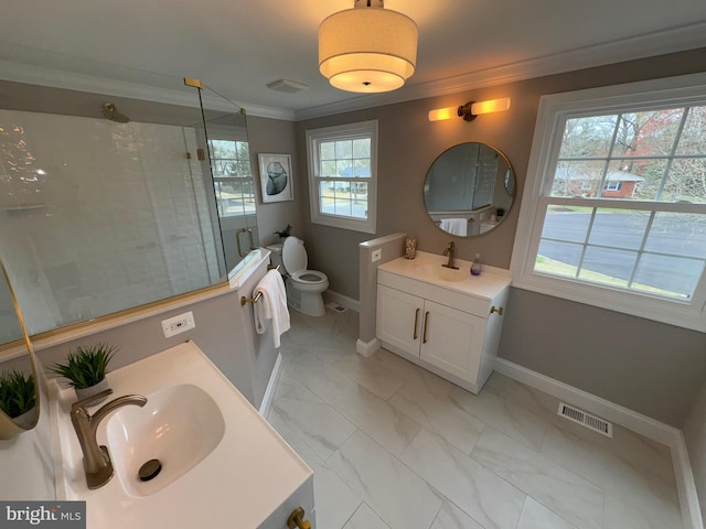 bathroom with a stall shower, crown molding, vanity, marble finish floor, and visible vents