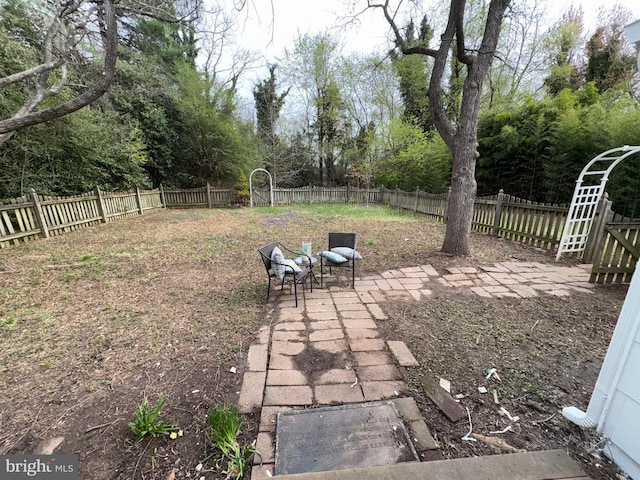view of yard with a fenced backyard