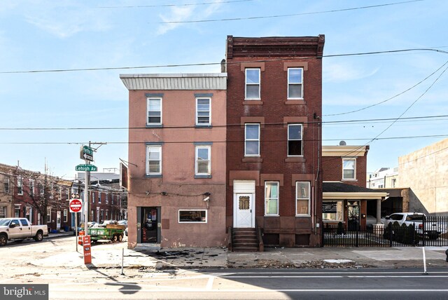 2124-2126 E Lehigh Ave, Philadelphia, PA 19125 - view of property featuring entry steps and fence