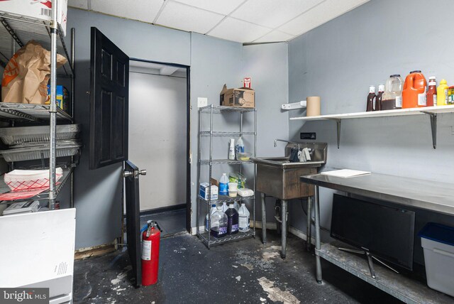 2124-2126 E Lehigh Ave, Philadelphia, PA 19125 - office featuring baseboards, concrete floors, and a paneled ceiling