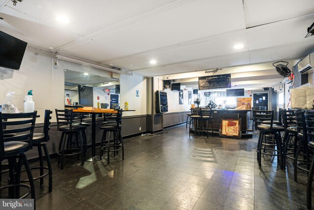 2124-2126 E Lehigh Ave, Philadelphia, PA 19125 - bar featuring a wall mounted air conditioner and tile patterned floors