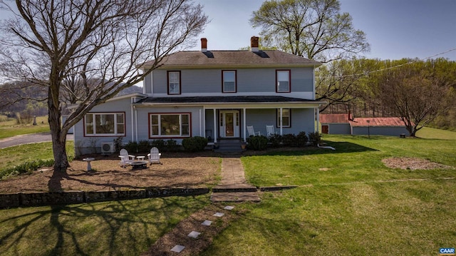 3716 Etlan Rd, Etlan, VA 22719 - view of front of house with a chimney, a porch, and a front yard