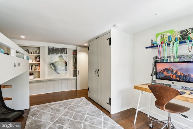 bedroom with wood finished floors