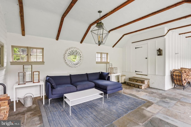 living area with stone finish floors