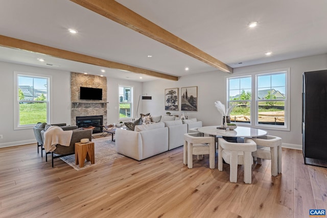 13A Sablewood Dr, Charlottesville, VA 22911 - living room featuring beamed ceiling, light wood-type flooring, baseboards, and a fireplace