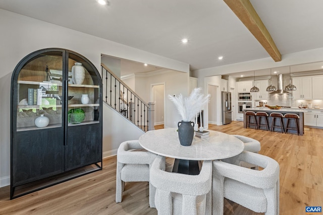 13A Sablewood Dr, Charlottesville, VA 22911 - dining area with beamed ceiling, light wood finished floors, baseboards, stairway, and recessed lighting