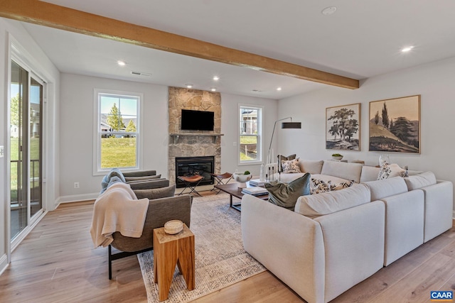 13A Sablewood Dr, Charlottesville, VA 22911 - living area with baseboards, a fireplace, light wood-style floors, and beamed ceiling