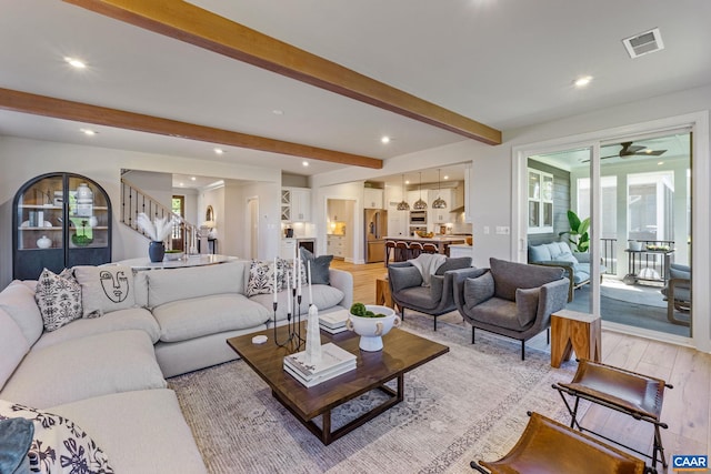 13A Sablewood Dr, Charlottesville, VA 22911 - living area with visible vents, beamed ceiling, stairs, recessed lighting, and light wood-style floors