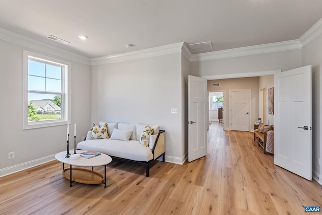 13A Sablewood Dr, Charlottesville, VA 22911 - living area with baseboards, visible vents, crown molding, and light wood-style flooring
