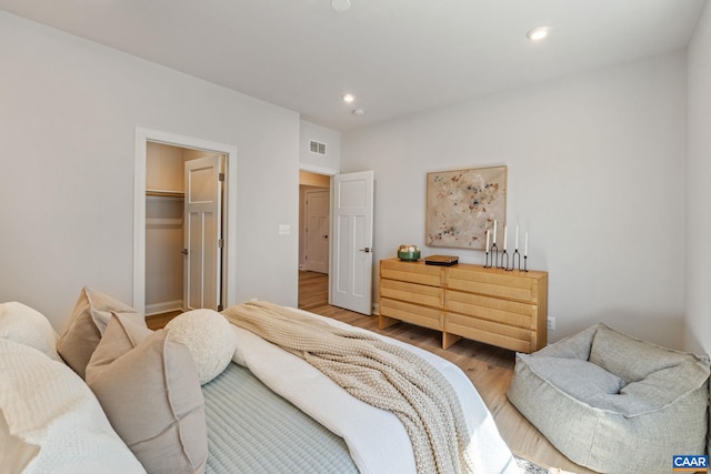 13A Sablewood Dr, Charlottesville, VA 22911 - bedroom with a walk in closet, visible vents, recessed lighting, and light wood finished floors