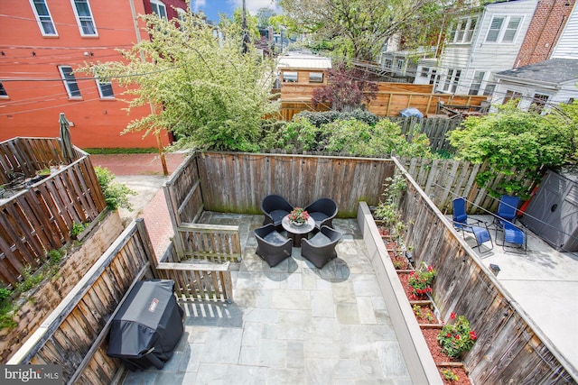 view of patio featuring a fenced backyard