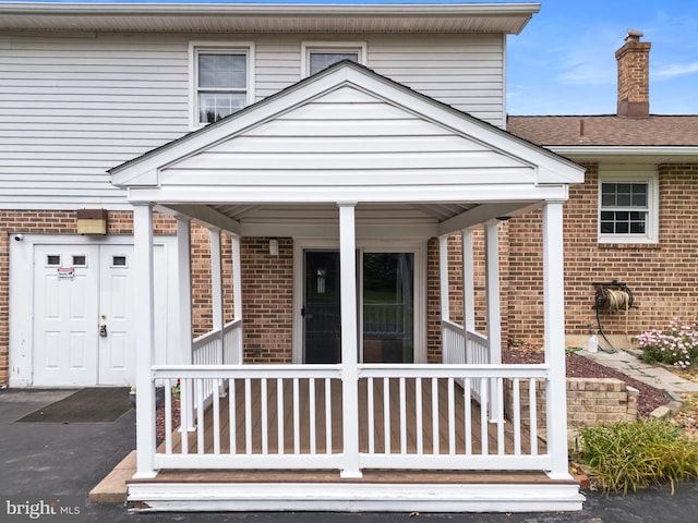 30 Stardust Dr, Newark, DE 19702 - entrance to property with brick siding and a porch