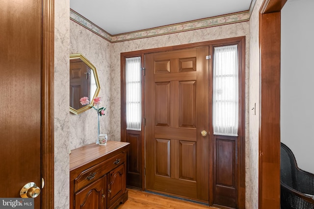 30 Stardust Dr, Newark, DE 19702 - entrance foyer with plenty of natural light, light wood-style floors, and wallpapered walls