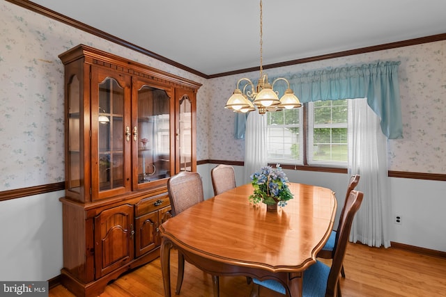30 Stardust Dr, Newark, DE 19702 - dining room featuring light wood-style flooring, a chandelier, wallpapered walls, and crown molding