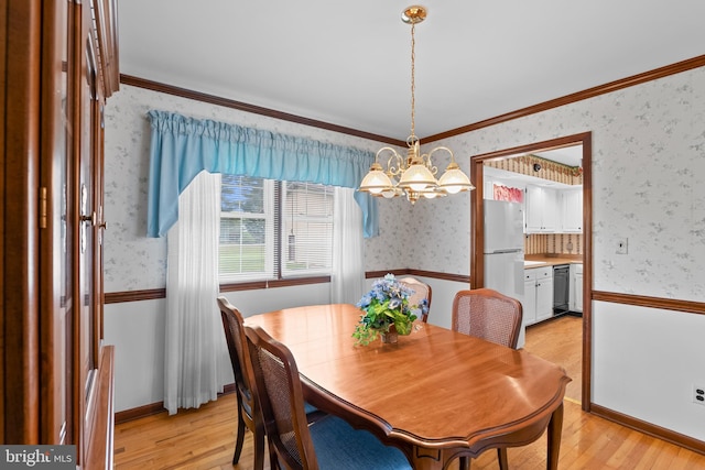 30 Stardust Dr, Newark, DE 19702 - dining area featuring wallpapered walls, a chandelier, light wood finished floors, and crown molding