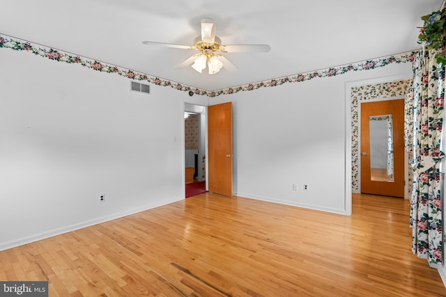 30 Stardust Dr, Newark, DE 19702 - spare room with light wood-type flooring, a ceiling fan, and baseboards