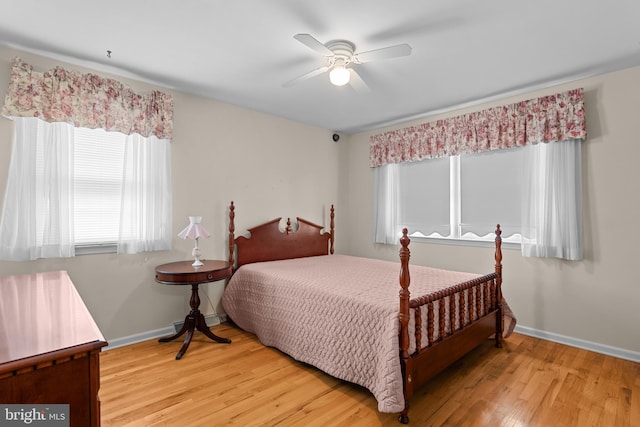 30 Stardust Dr, Newark, DE 19702 - bedroom featuring multiple windows, baseboards, light wood finished floors, and ceiling fan