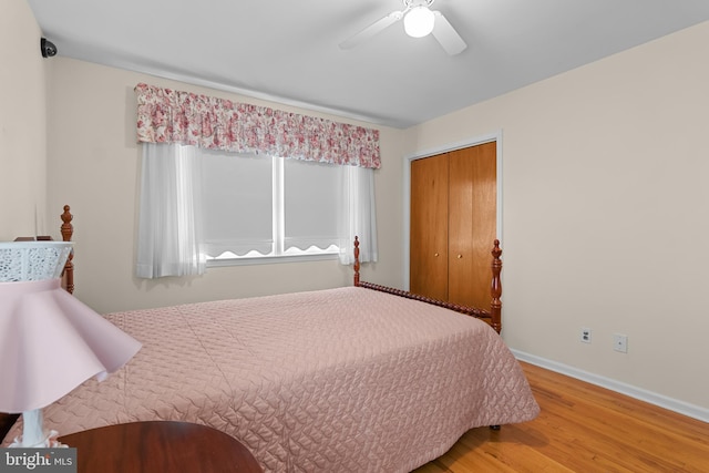 30 Stardust Dr, Newark, DE 19702 - bedroom with wood finished floors, baseboards, a closet, and a ceiling fan