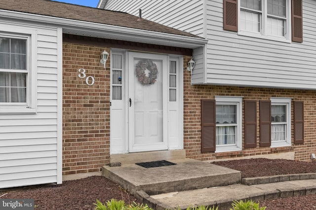 30 Stardust Dr, Newark, DE 19702 - property entrance featuring brick siding and a shingled roof