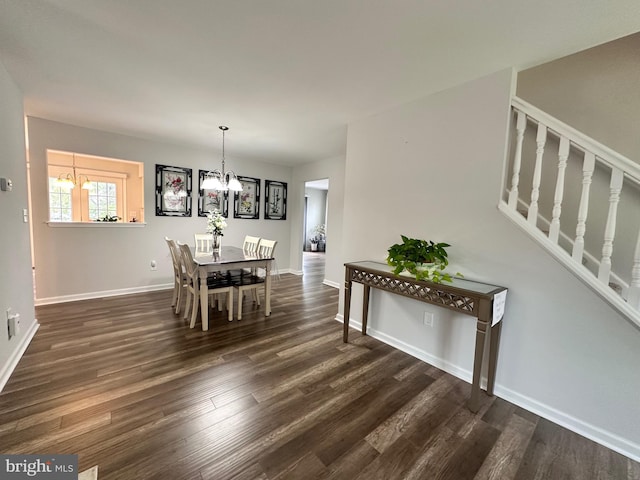 dining space with stairs, an inviting chandelier, dark wood-style flooring, and baseboards