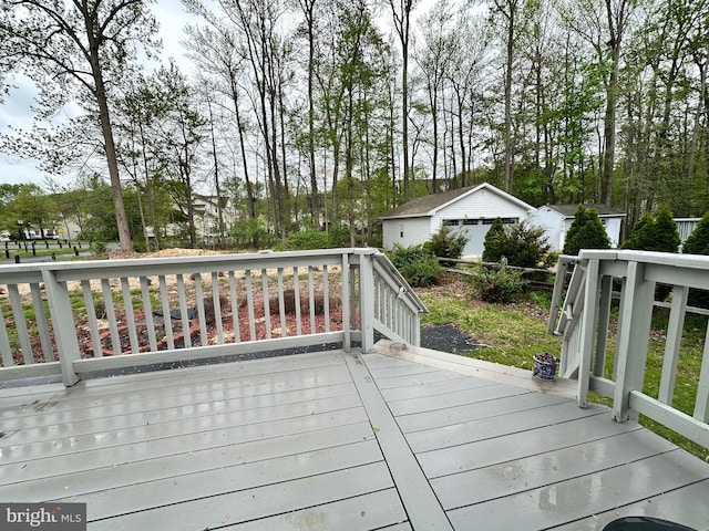deck with an outdoor structure