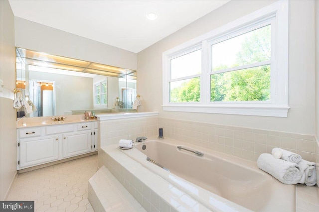 8412 Dasher Ct, Gaithersburg, MD 20882 - full bath featuring plenty of natural light, vanity, a garden tub, and tile patterned floors