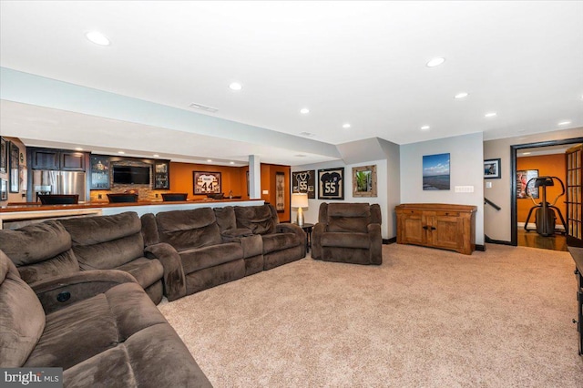 8412 Dasher Ct, Gaithersburg, MD 20882 - living room with recessed lighting, light carpet, and bar