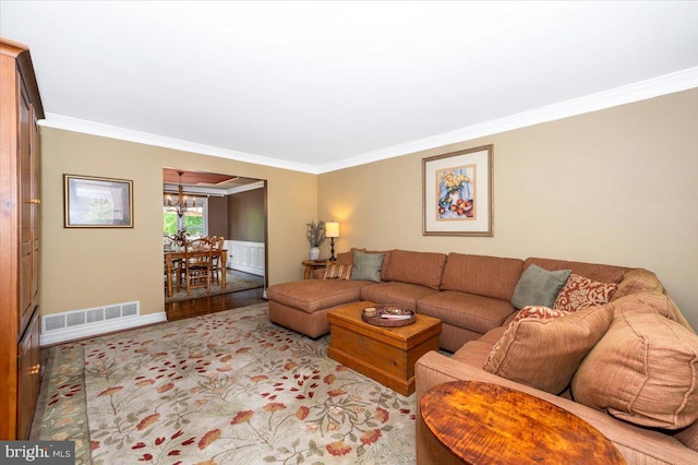 8412 Dasher Ct, Gaithersburg, MD 20882 - living room with ornamental molding, a chandelier, wood finished floors, and baseboards