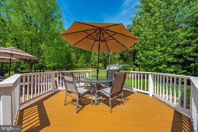 8412 Dasher Ct, Gaithersburg, MD 20882 - wooden terrace with outdoor dining space