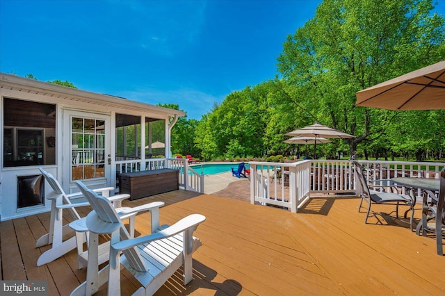 8412 Dasher Ct, Gaithersburg, MD 20882 - wooden terrace featuring an outdoor pool and outdoor dining area