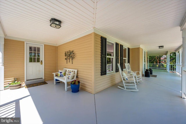 8412 Dasher Ct, Gaithersburg, MD 20882 - view of patio featuring a porch