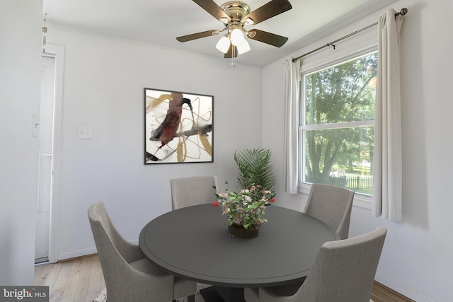 1722 Antler Ln, Finksburg, MD 21048 - dining space with light wood-style flooring, a ceiling fan, and baseboards
