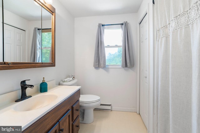 1722 Antler Ln, Finksburg, MD 21048 - bathroom with a baseboard radiator, vanity, plenty of natural light, and toilet