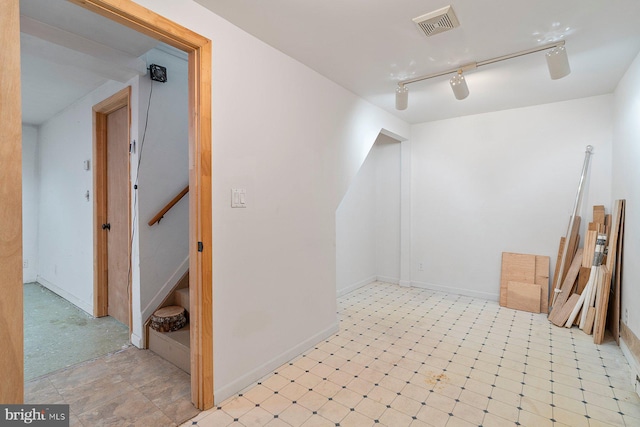 1722 Antler Ln, Finksburg, MD 21048 - below grade area featuring rail lighting, stairway, and baseboards