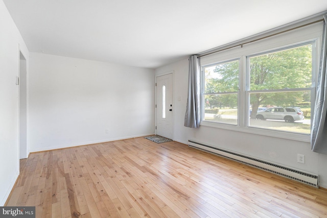 1722 Antler Ln, Finksburg, MD 21048 - entryway with a baseboard radiator and light wood-type flooring