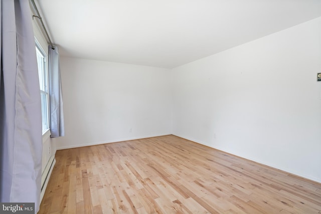 1722 Antler Ln, Finksburg, MD 21048 - unfurnished room featuring light wood-style floors, plenty of natural light, and a baseboard radiator