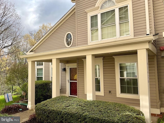 43426 Edgecliff Ter, Ashburn, VA 20147 - property entrance featuring a porch