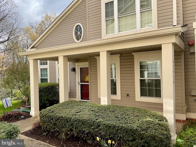 43426 Edgecliff Ter, Ashburn, VA 20147 - doorway to property with covered porch