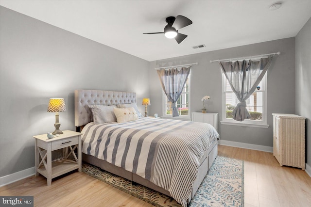 43426 Edgecliff Ter, Ashburn, VA 20147 - bedroom with visible vents, baseboards, wood finished floors, and radiator
