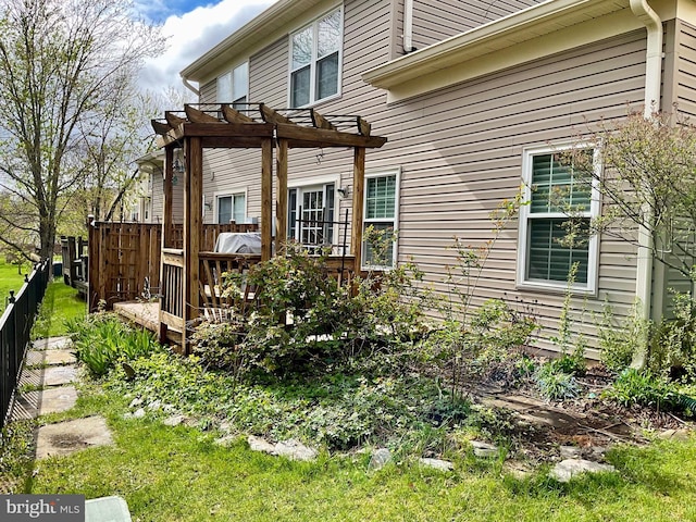 43426 Edgecliff Ter, Ashburn, VA 20147 - back of house with fence, a wooden deck, and a pergola