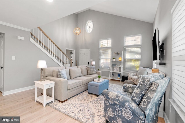 43426 Edgecliff Ter, Ashburn, VA 20147 - living area with baseboards, high vaulted ceiling, stairs, and wood finished floors