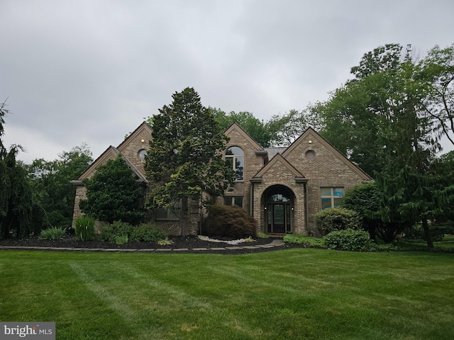 671 N Heilbron Dr, Media, PA 19063 - view of front of property with a front lawn and brick siding
