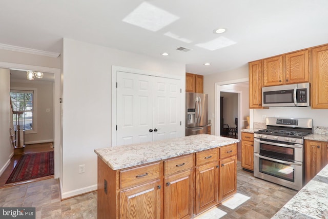 8519 Century Oak Ct, Fairfax Station, VA 22039 - kitchen with visible vents, baseboards, appliances with stainless steel finishes, and light stone countertops