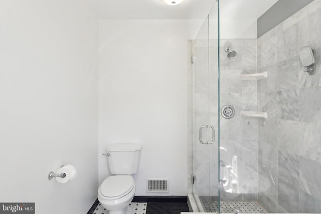 8519 Century Oak Ct, Fairfax Station, VA 22039 - full bathroom with a shower stall, baseboards, visible vents, and toilet